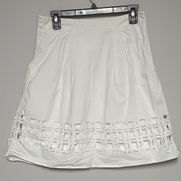 White Knee-Length A-Line Skirt with Pleated Cutout Design - Picture 1 of 5